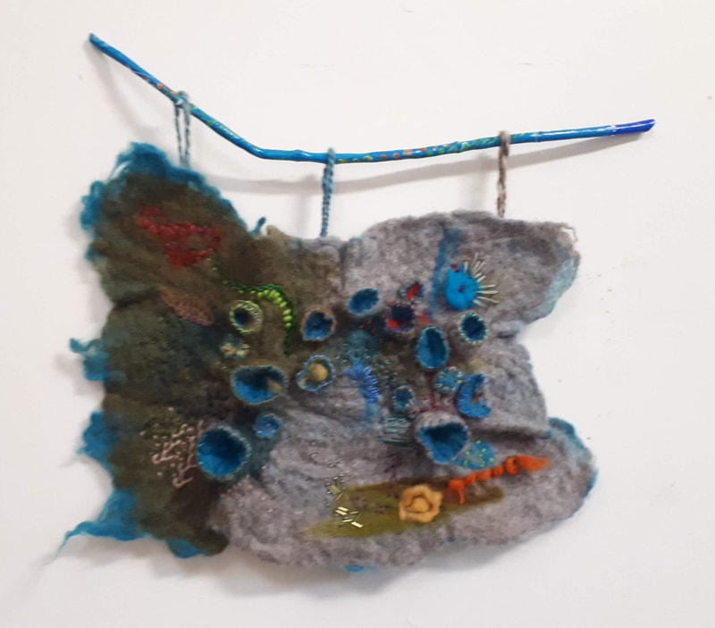 Wet and needle felted hanging,